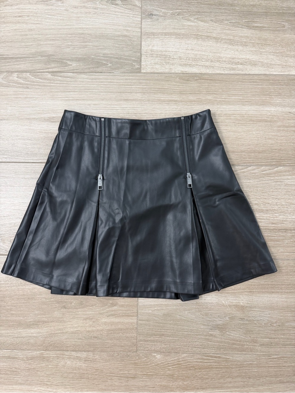 Black Faux Leather Pleated DKNY Mini Skirt with Zip Details